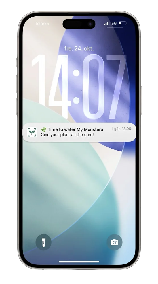 PlantMD lock-screen notification reminding the user it's time to water My Monstera